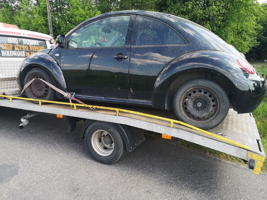 VW New Beetle części od a-z mocowanie okular lampy prawy przód  orygin