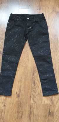 TOTALNA WYPRZ. Czarne jeansy brokatowe 128r. 8 year.
