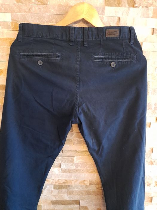 Męskie spodnie granatowe Stanley casual 31 M
Granatowe