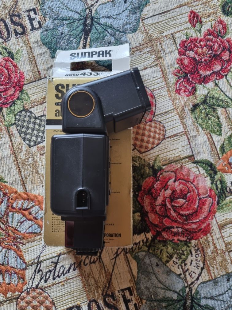 Спалах Minolta Canon
