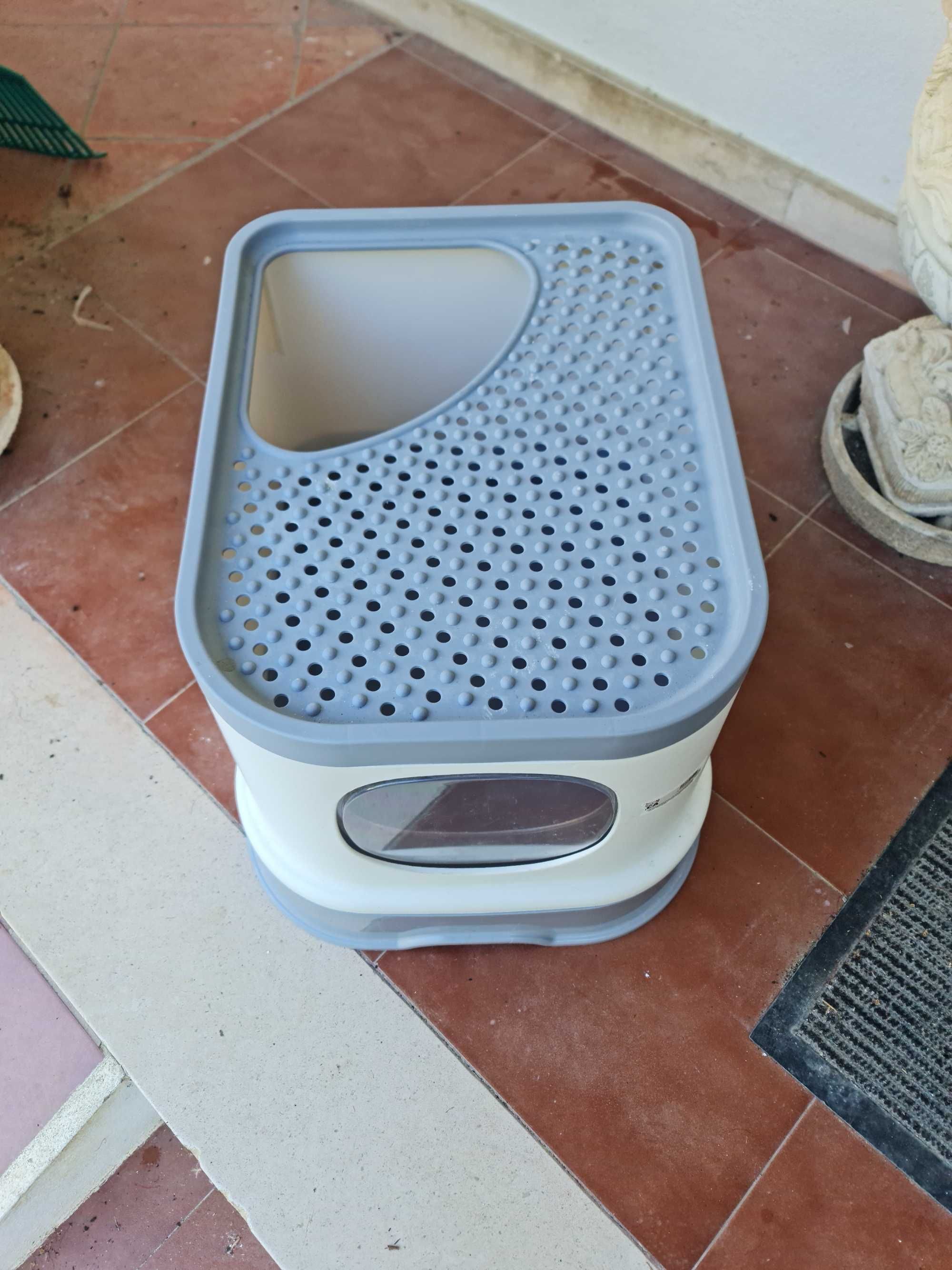 Casa de banho para gato