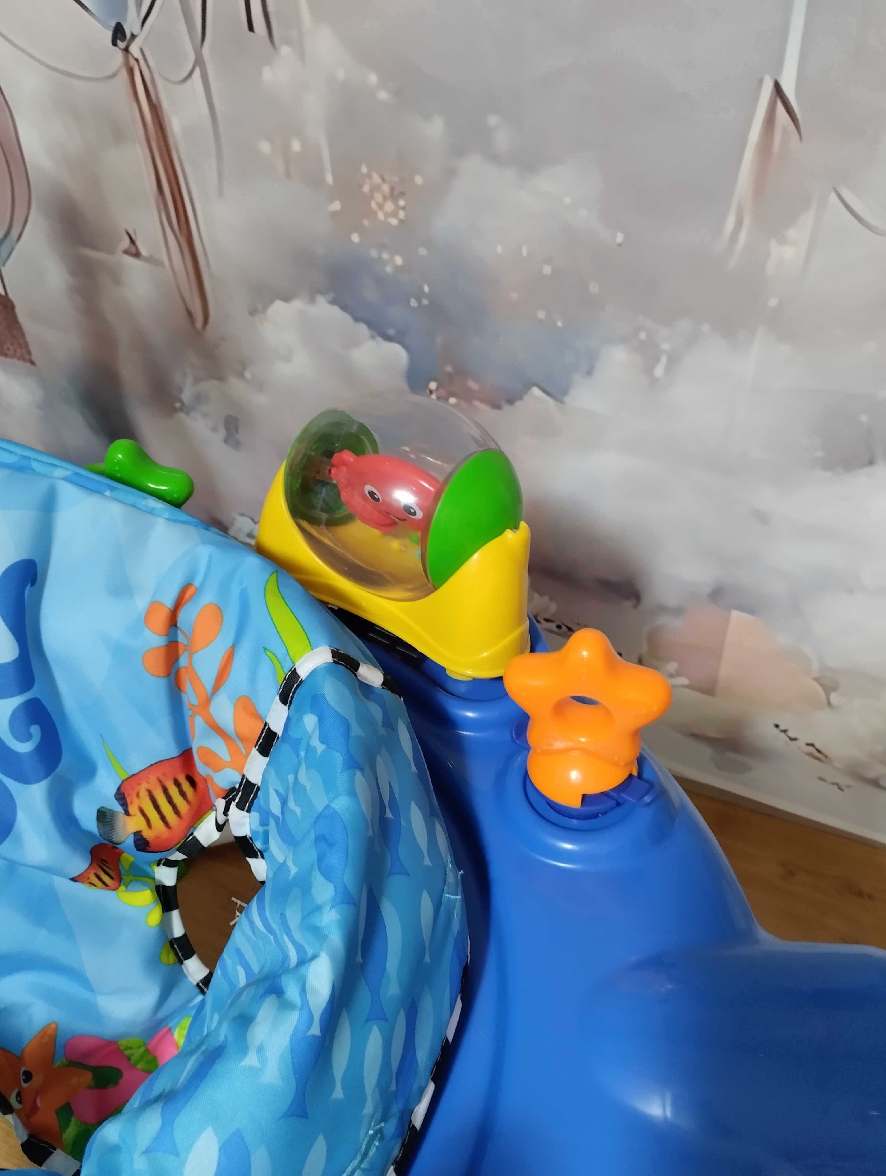 Skoczek interaktywny Baby Einstein Neptune Ocean stolik edukacyjny 360