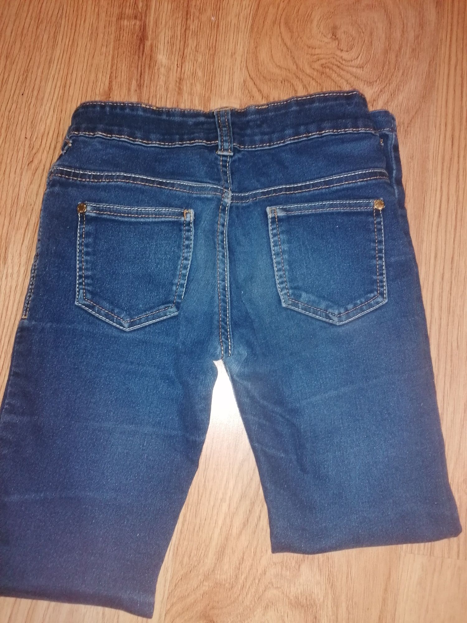 Spodnie dżinsowe dla dziewczynki rozmiar 134 cm