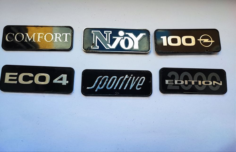 Znaczek emblemat drzwi Opel Astra Vectra