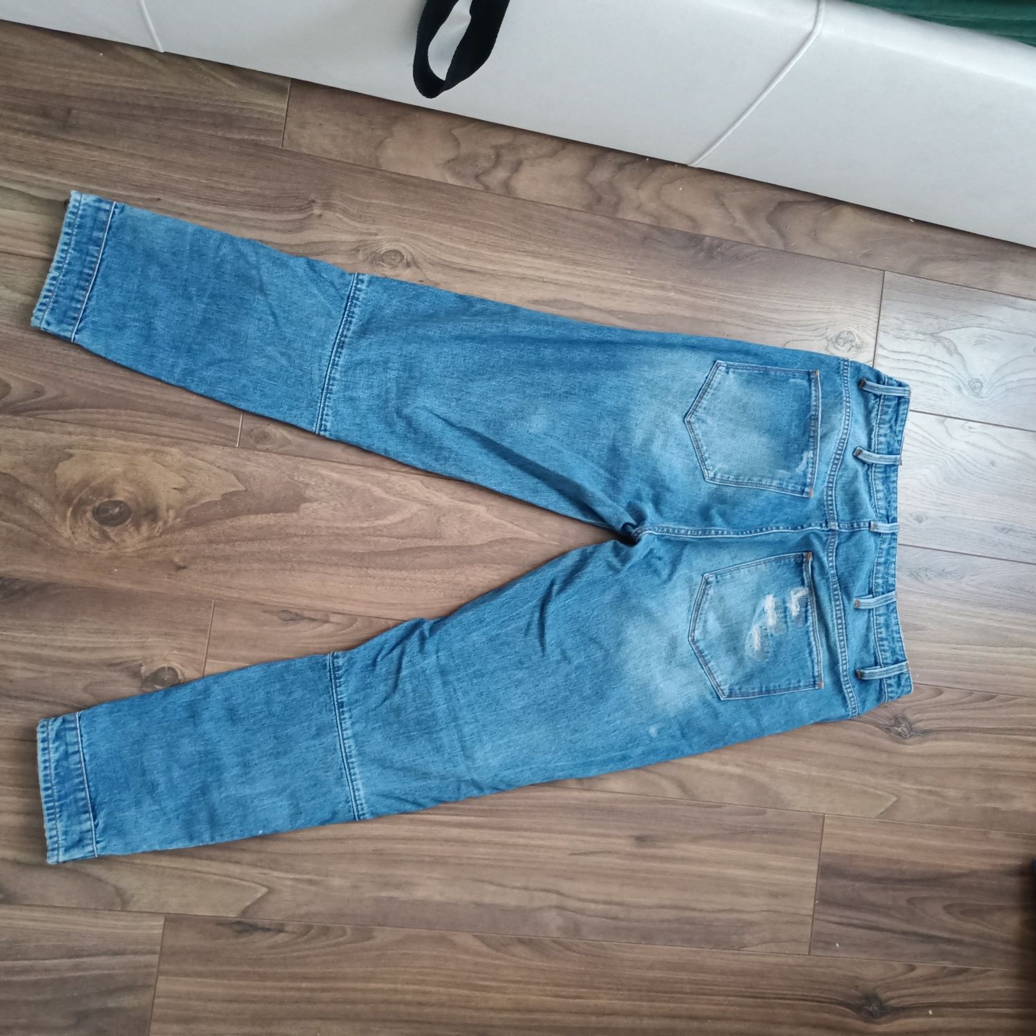 Spodnie damskie jeansy z zamkami na nogawkach