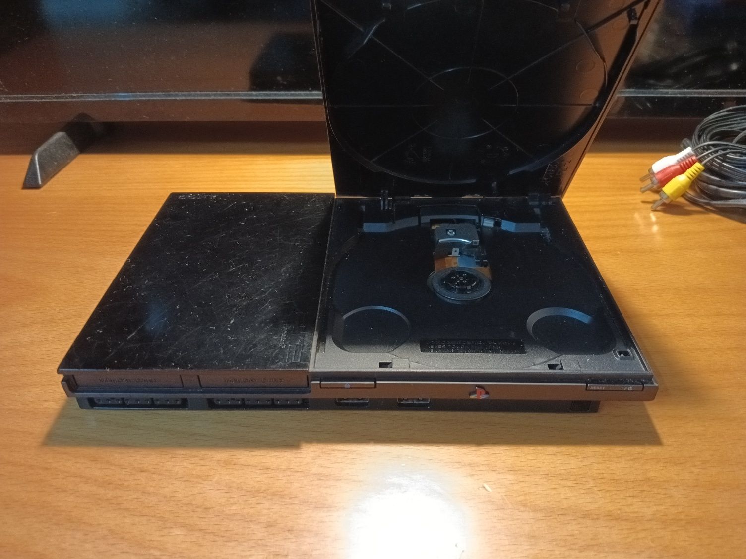 PlayStation 2 + comando original + memory card + 7 jogos (ótimo estado