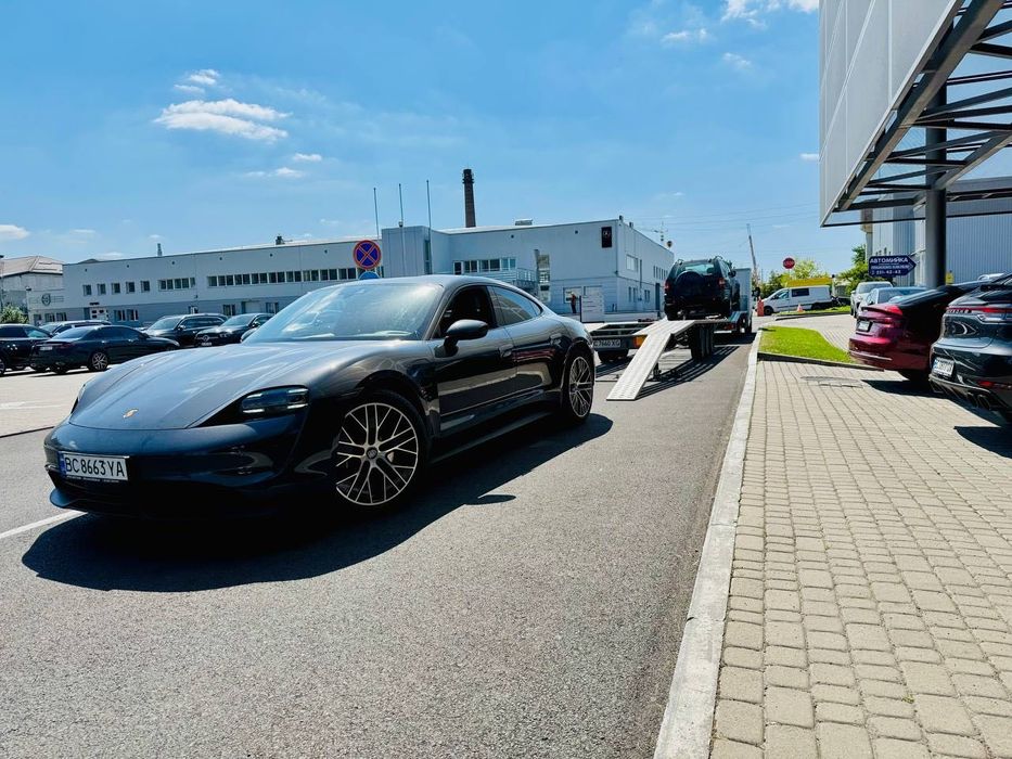 послуги евакуатора Суми перевезення по Україні доставка авто евакуатор