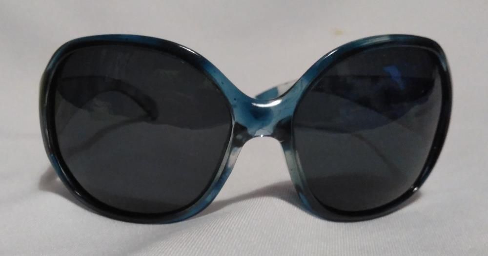 Oculos de sol senhora