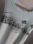 Pull&Bear Palm Springs blekitna bluzka z wycieciami pod pachami bandea
