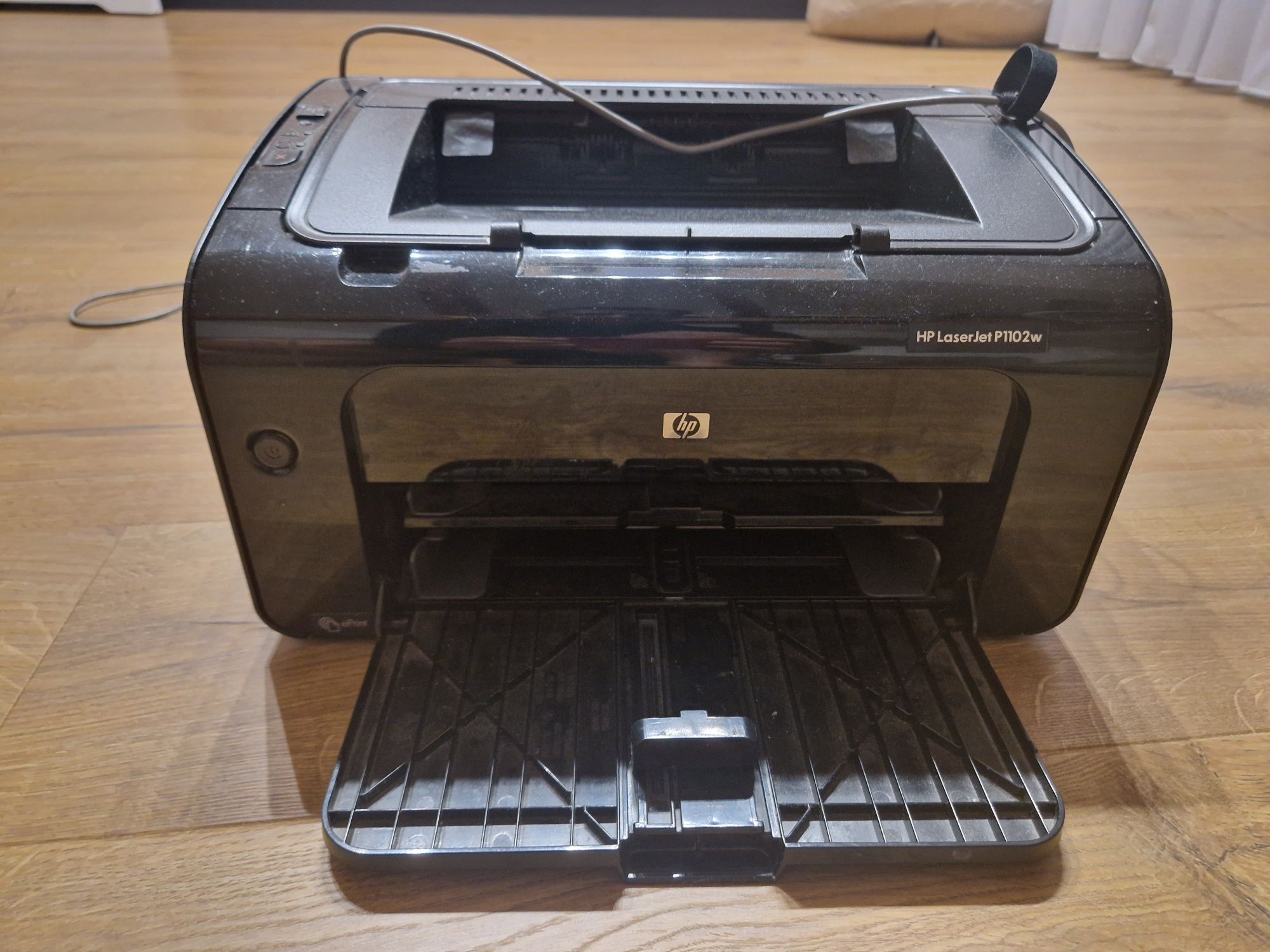 Drukarka HP LaserJet P1102w, sprawną, tania w eksplatacji