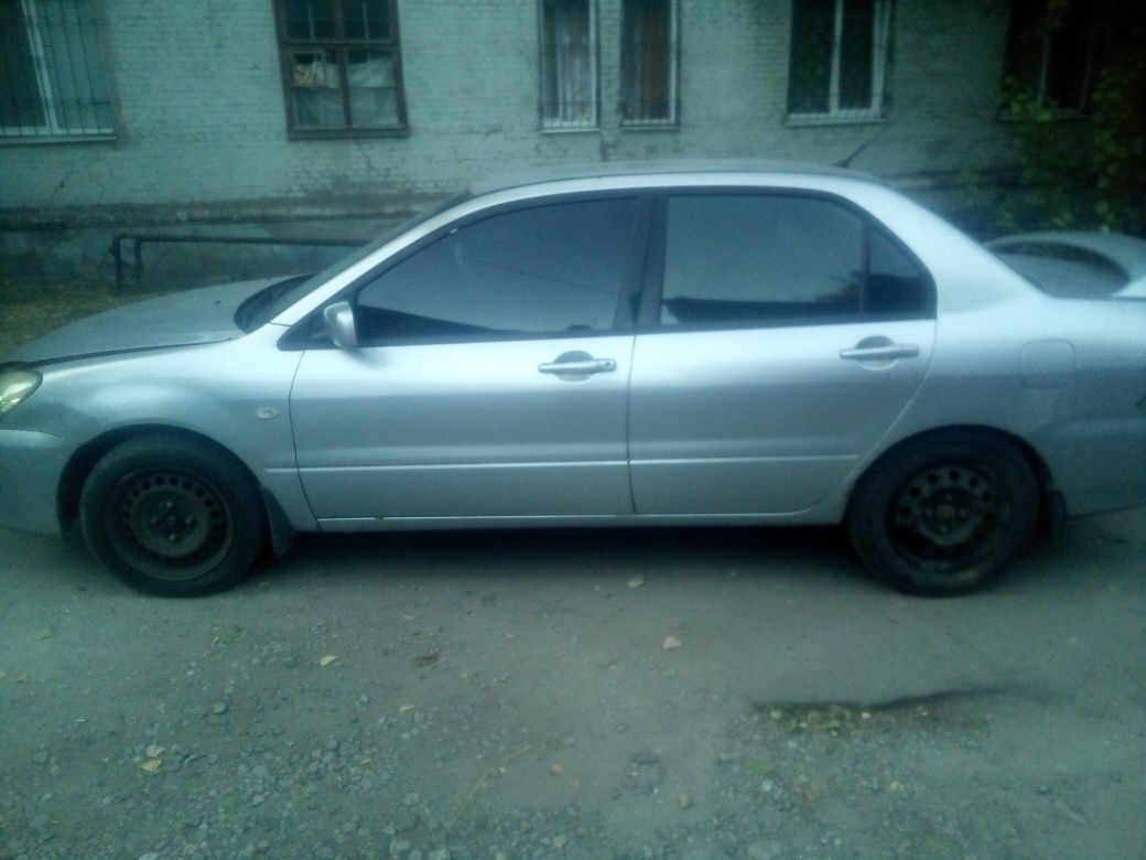 Мицубиси ланцер 2004