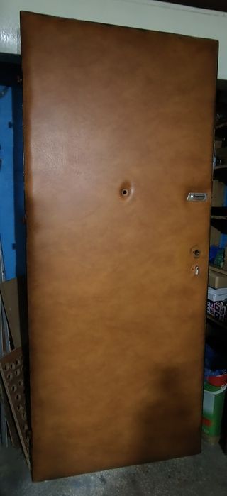 Drzwi wewnętrzne-klatkowe z obiciem kolor jasny brąz