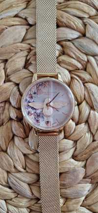 Zegarek damski Olivia Burto złoty na bransoletce z pszczołą w kwiaty