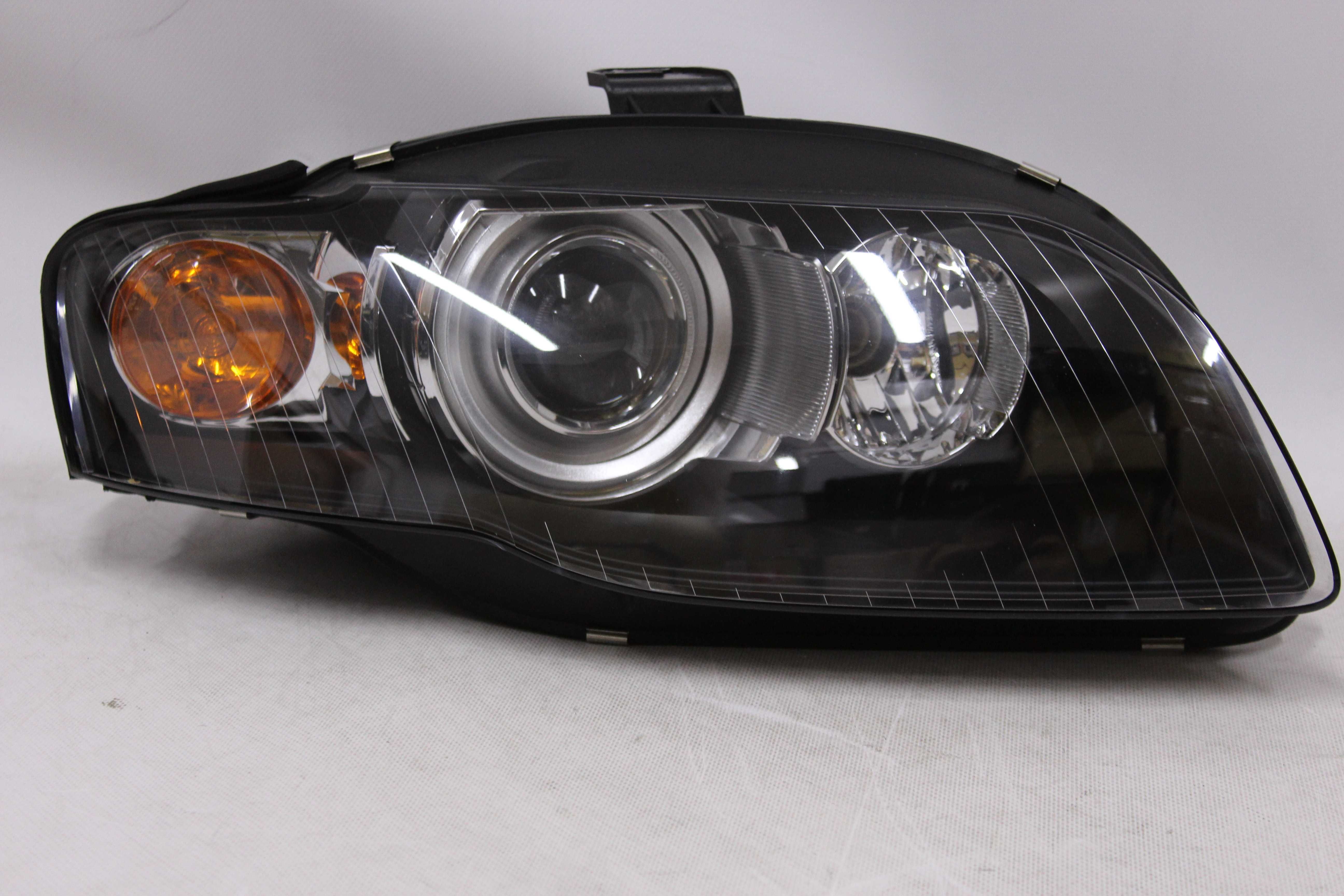 Lampy reflektory przednie przód AUDI A4 B7 04-08 XENON D1S SOCZEWKA !