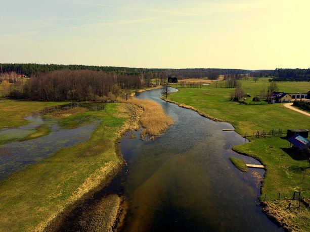 Działka z linią brzegową rzeki Ełk.