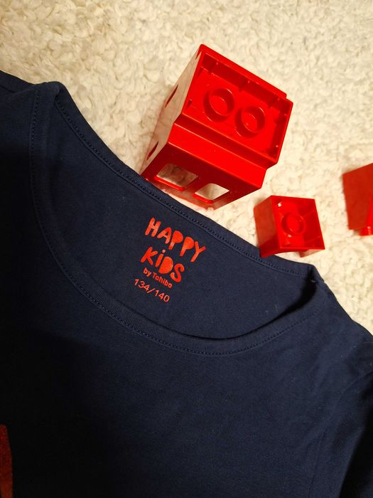 Bluzka dla dziewczynki z czerwonymi i brokatowymi gwiazdami -nowa