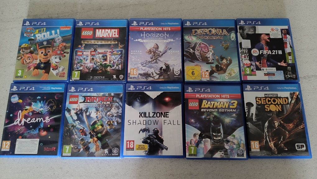 Konsola PS4 pro + 2 pady + kierownica Tracer + 10 gier