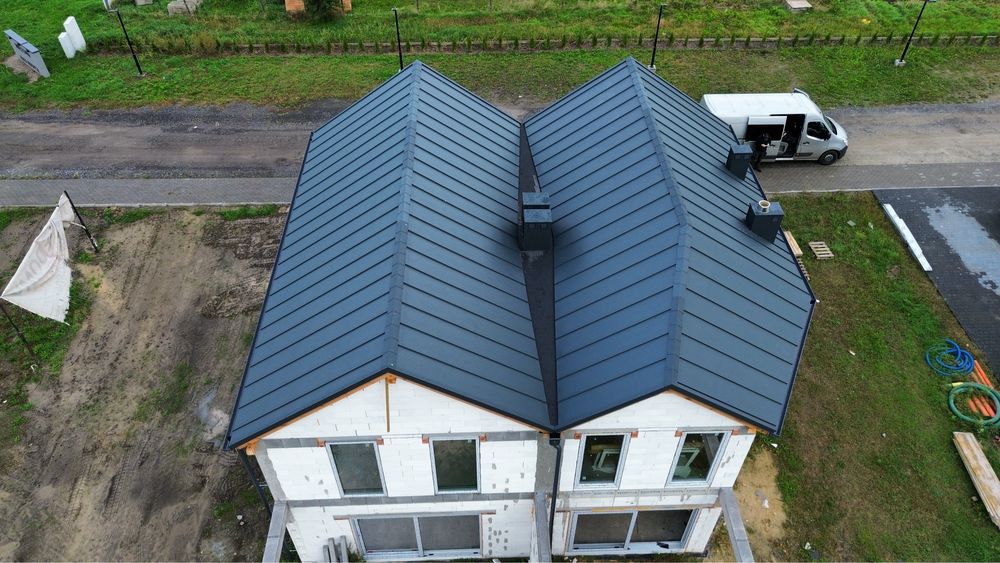 Więźby, pokrycia dachowe,obróbki kominów, dachy płaskie,podbitki