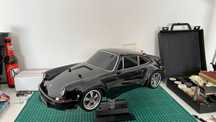 Tamiya TT02 Porsche 911 escala 1:10 carro telecomandado preto