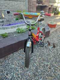 Дитячий велосипед с додатковими колісчатами