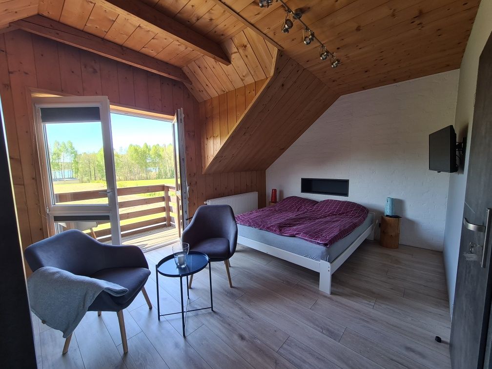 Spokoje- Noclegi nad jeziorem Apartament,plaża,łódki,balia
