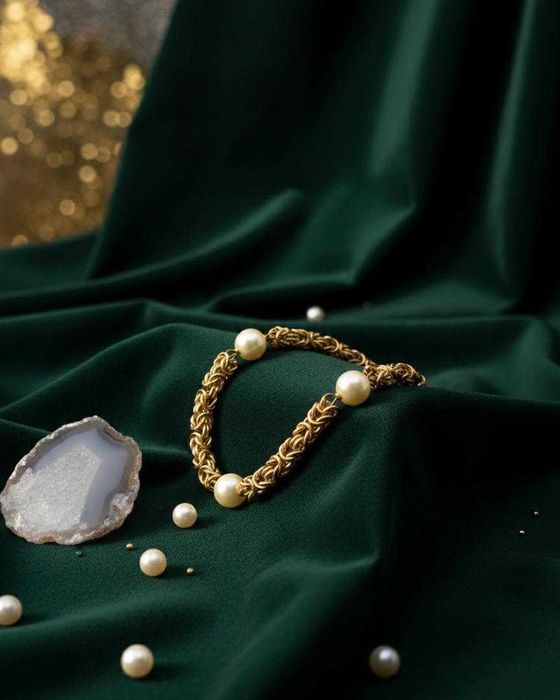 Pulseira em ouro 19.2k de malha de elos entrelaçados com pérolas