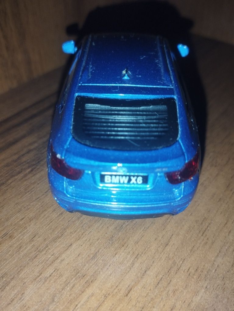 Модель автомобиля bmv x6 1:43 фирмы "Автопром"