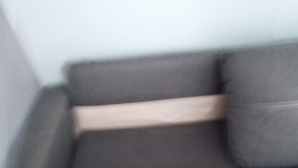 Sofa z funkcją spania i pojemnikiem