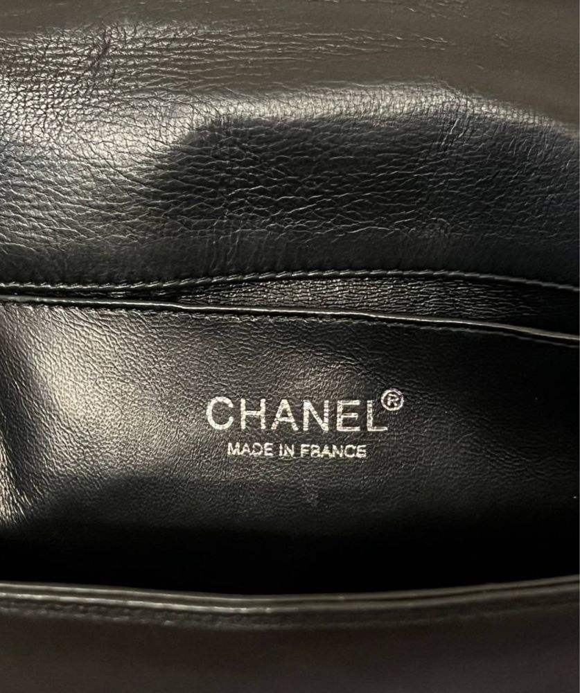 Сумка Chanel з натуральної шкіри та шкіри питону .