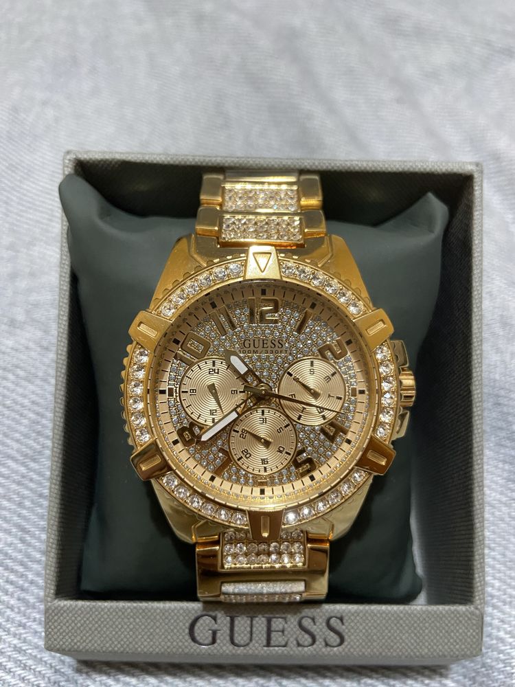 Relogio guess dourado