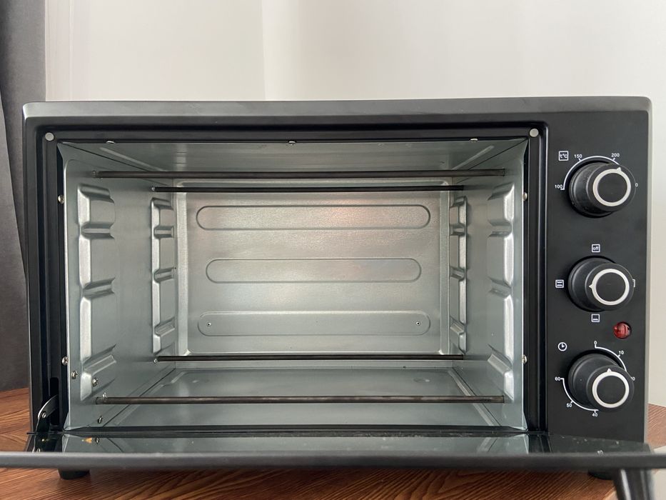 Електро піч до 250 градусів 35л. 1800вт HEO-183B  Holmer