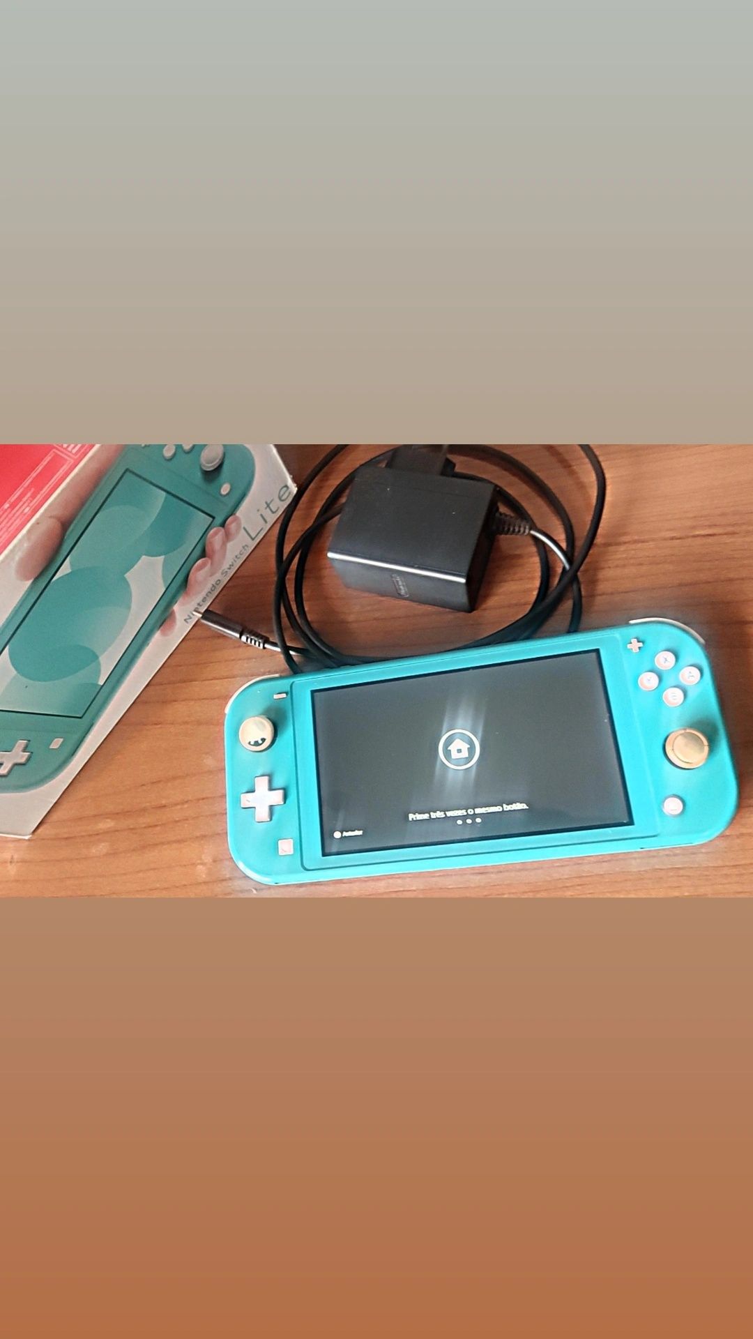 Nintendo Switch Lite Azul  (USADA)+ cartão de memória 32gb vendo ou tr