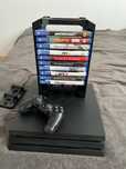 Sprzedam konsole ps4 pro 1 tera w raz z grami