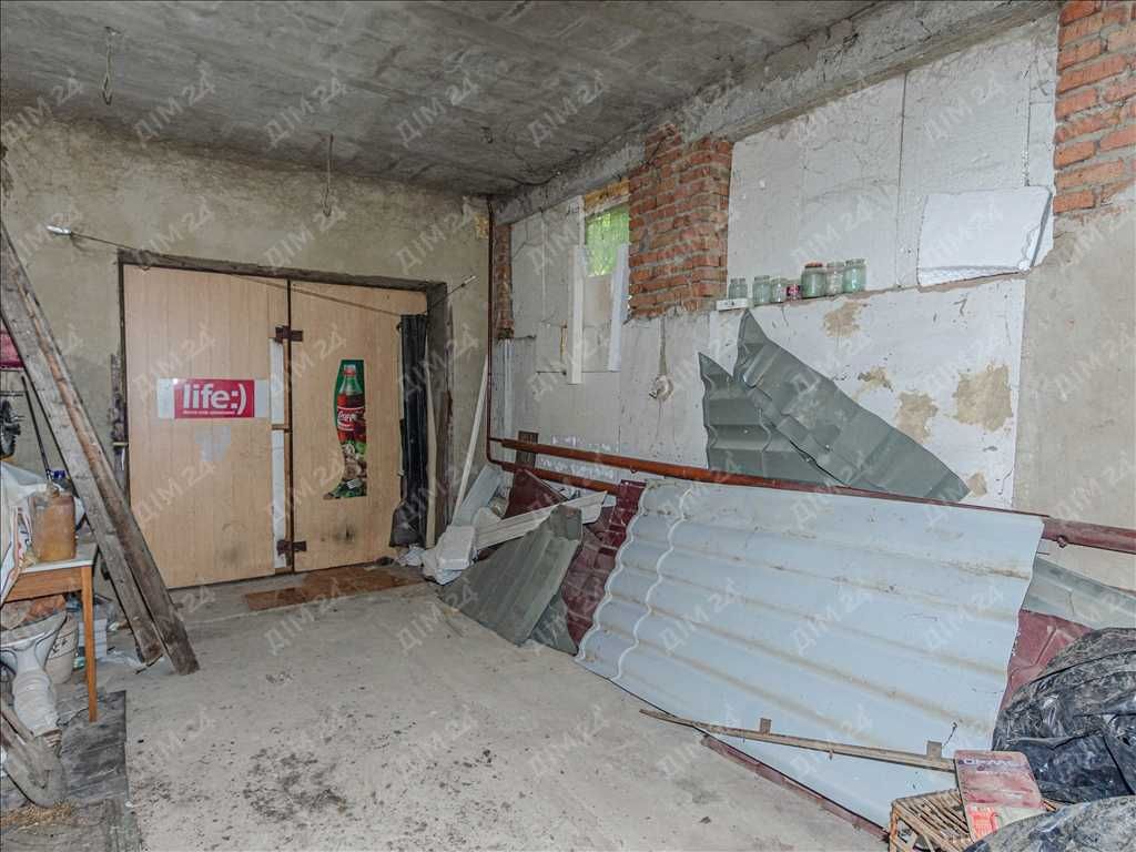 Цегляний будинок на Вороніна