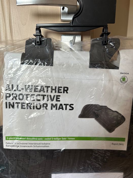 Оригінальні задні килимки в салон Skoda Rapid