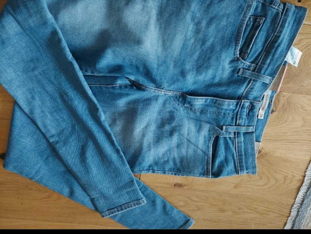 Damskie nowe spodnie levis model 720 high rise super skinny 28x30