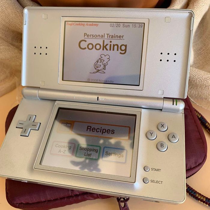 Портативна приставка Nintendo DS Lite, стілус, гра шнур зарядки, сумка