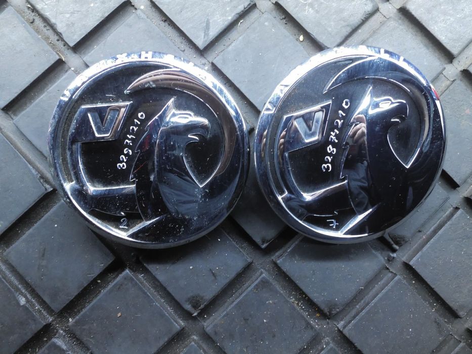 LOGO PRZYCISK KLAPY TYLNEJ OPEL ASTRA J IV HB 39061716