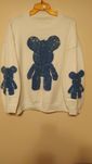 Sweter z cekinowym misiem