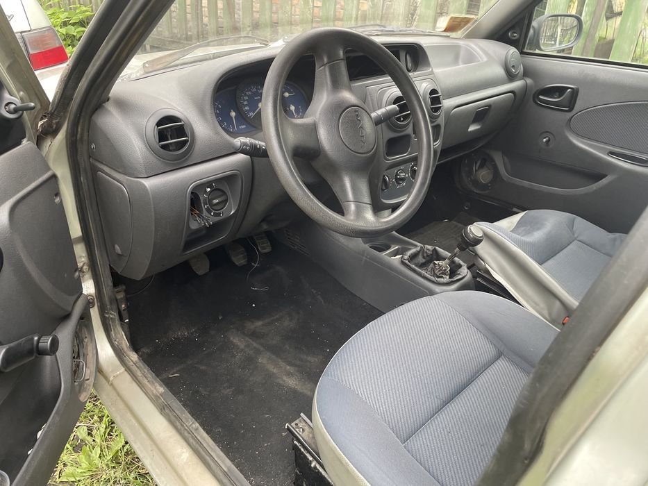 Dacia Solenza двері багажник бампер крило мотор стартер РОЗБОРКА