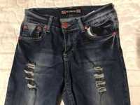 Modne jeansy 146/152