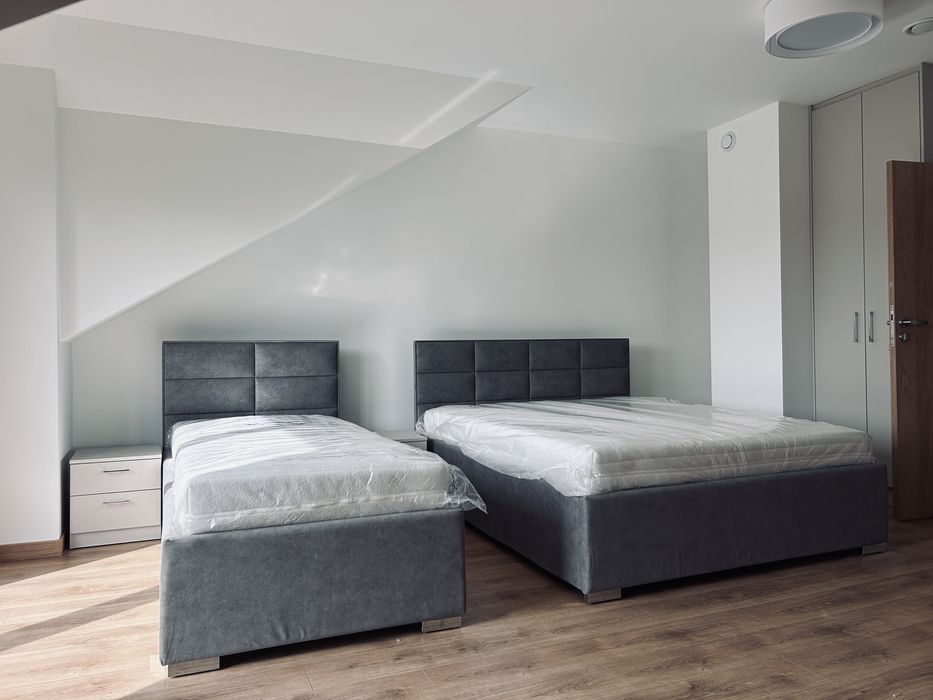 Łóżka tapicerowane na wymiar – solidne, eleganckie, nowoczesne