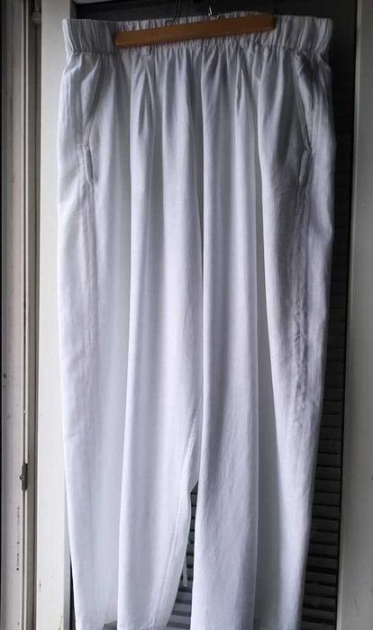 Белые льняные  брюки  фасон бананы  на бедра 120 см  лен льон лляні