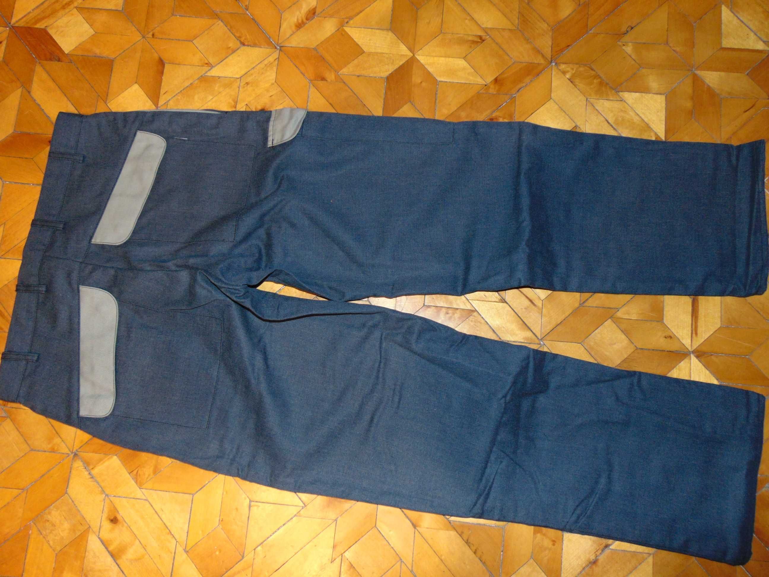 UVEX firmowe spodnie dla spawacza nowe  r 48,58