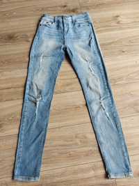 Spodnie damskie jeans reserved 36