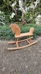 Konik bujany drewniany