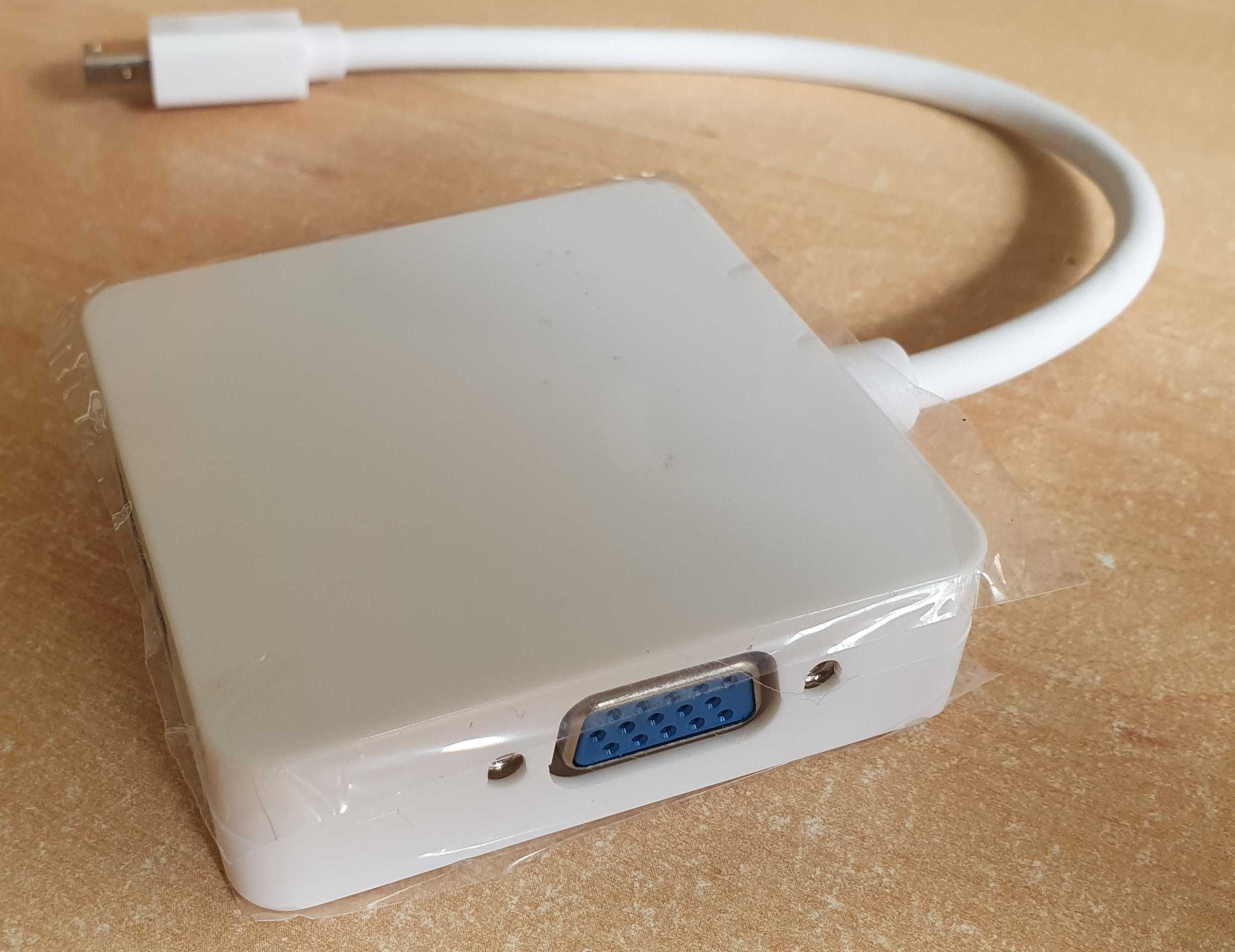 Cabos adaptadores: mini DVI Port -> VGA + mini DP -> hdmi, VGA e DVI