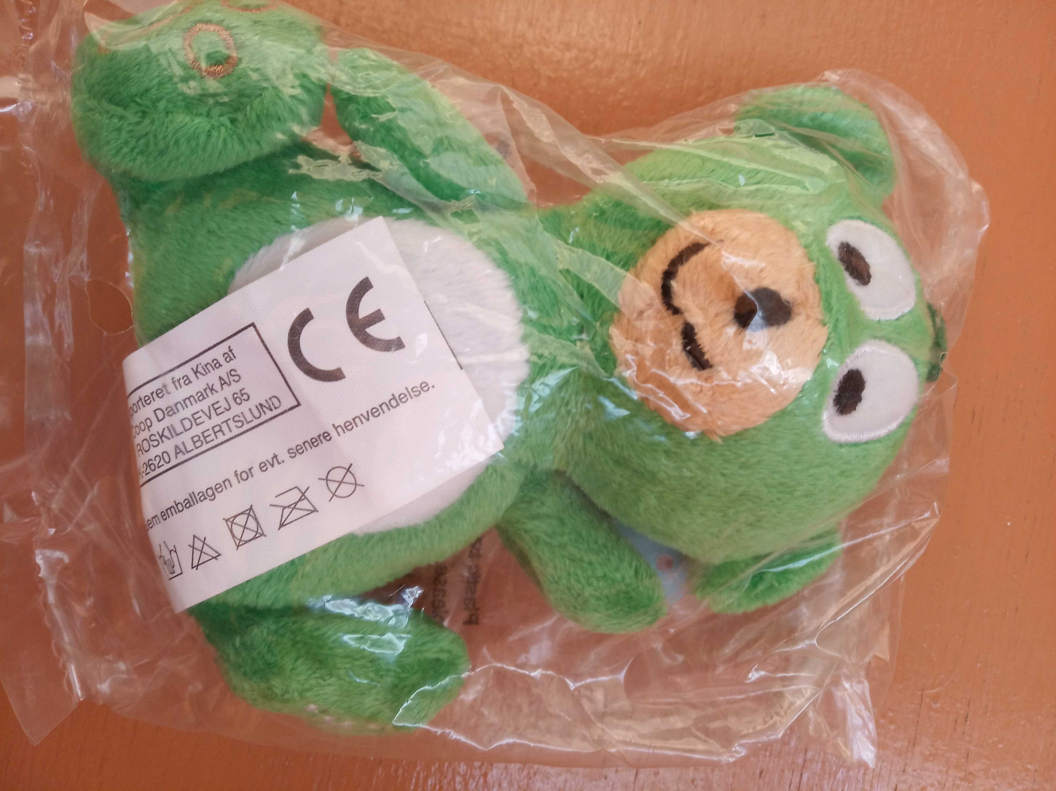 Невелика нова м"яка іграшка зеленого ведмедика в упаковці