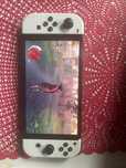 Nintendo Switch OLED + 3 gry