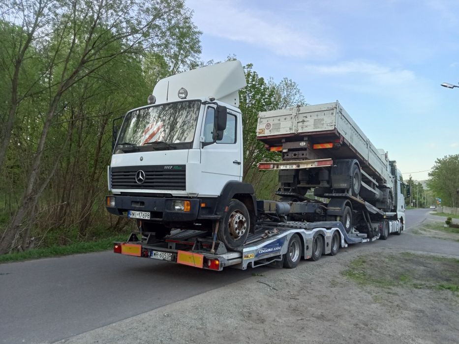 Transport maszyn rolniczych budowlanych laweta pomoc drogowa holowanie